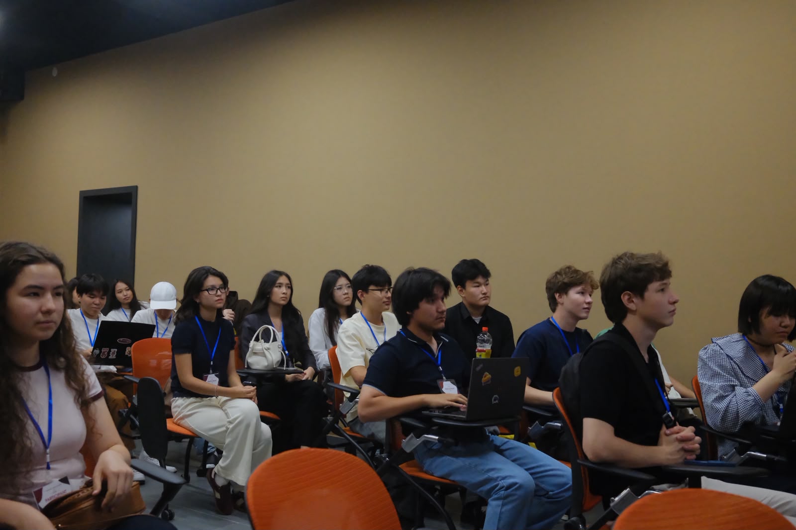 Students listening during a finance workshop